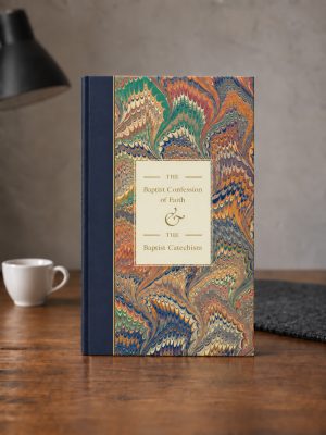 Marbled-navy-hardcover-on-a-walnut-desk